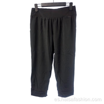 Pantalón elástico negro de cintura alta para el verano